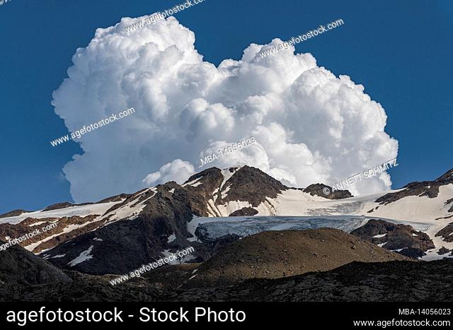 storm clouds over the venetian peaks in south tyrol