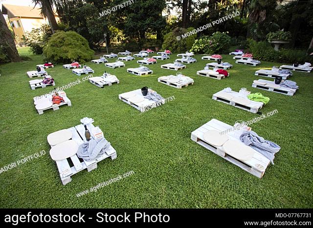 Pallets arranged according to the anti-Covid19 rules on the lawn of Villa Zappa Bencini waiting for the first concert with Irene Grandi as part of the MUSICNIC...