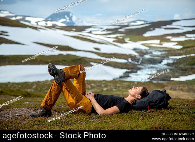 Female hiker resting