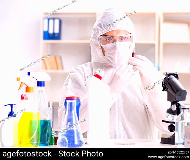 The chemist checking the quality of bathroom supplies