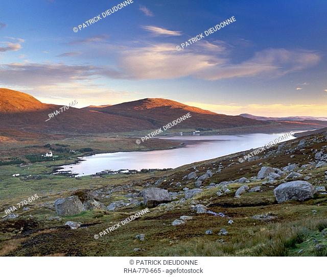 View over Ardvourlie Aird a Mhulhaid, Borglass Bogha Glass and Loch Seaforth, at dawn, North Harris, Outer Hebrides, Scotland, United Kingdom, Europe