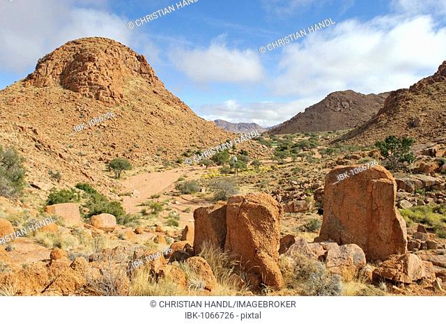 View over granite rocks toward the Namtib Lodge in the Tiras mountains, Namibia, Africa