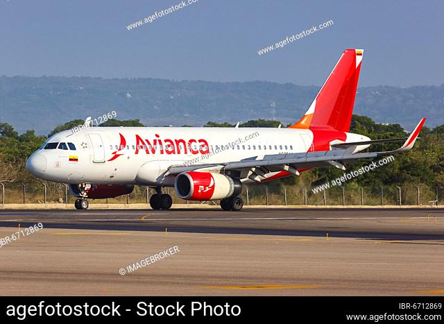 An Avianca Airbus A319 aircraft with registration N695AV at Cartagena Airport, Colombia, South America