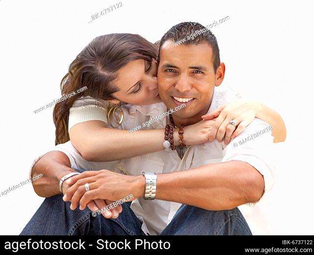 Happy young attractive hispanic couple isolated on a white background
