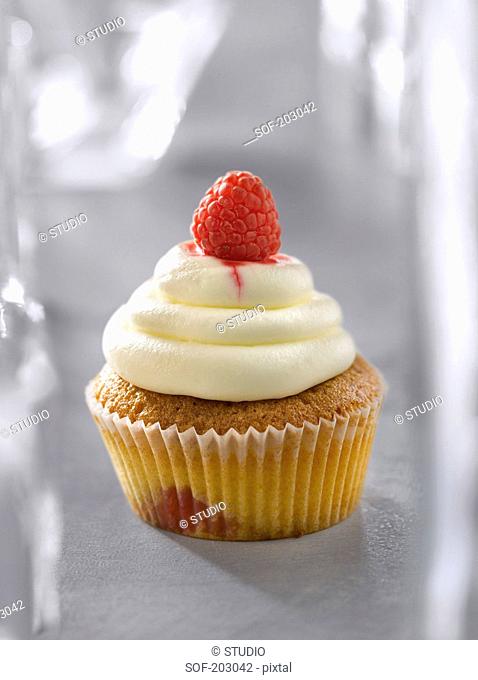 Cream cheese and raspberry cupcake