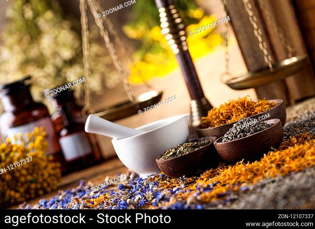 Natural medicine on wooden table background