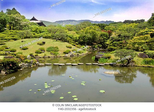 Isuien Garden, Nara, Japan, Todaiji Temple in distance, Incorporated into the garden as 'borrowed scenery', Meandering pond, Flowers of late spring