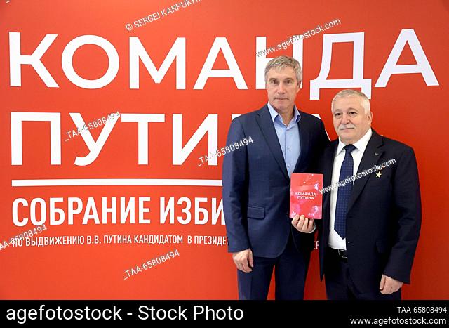 RUSSIA, MOSCOW - DECEMBER 16, 2023: Roscosmos executive director for manned space missions, cosmonaut Sergei Krikalev (L) and Roscosmos cosmonaut Fyodor...