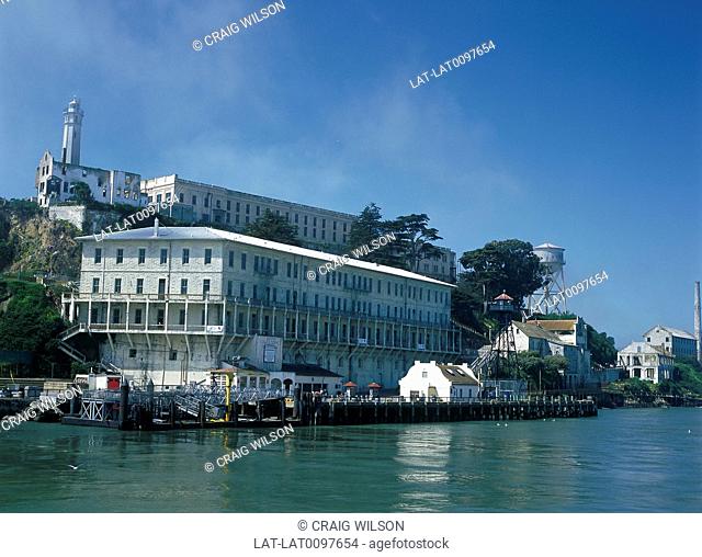 Bay. Alcatraz former prison fortress. Now museum. Lighthouse. Quayside