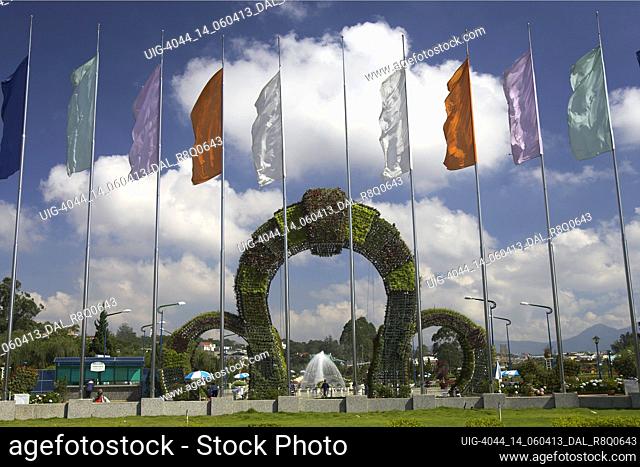 Flags fountain and entrance plant arches Dalat Flower Gardens Dalat south east Vietnam