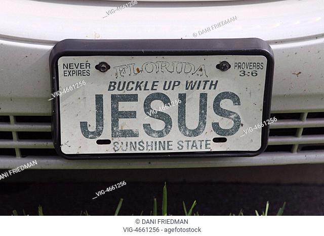 UNITED STATES OF AMERICA, MARCO ISLAND, 06.08.2013, 'Buckle up with Jesus' vanity vehicle plate on the front of a car in Florida, USA