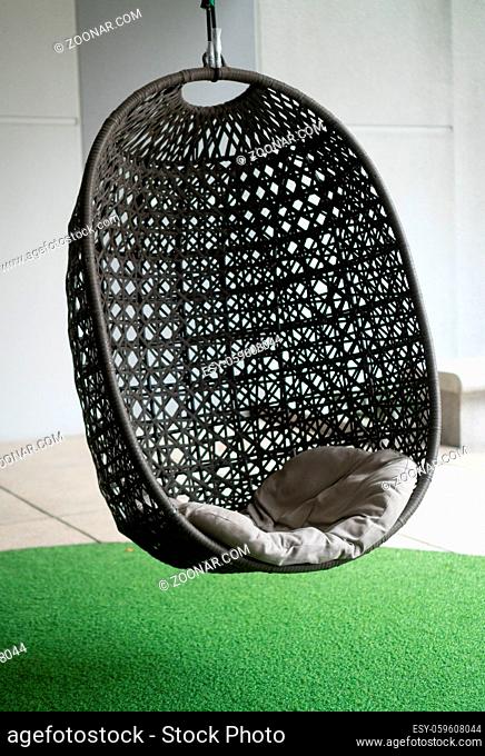 Empty modern nest chair indoors