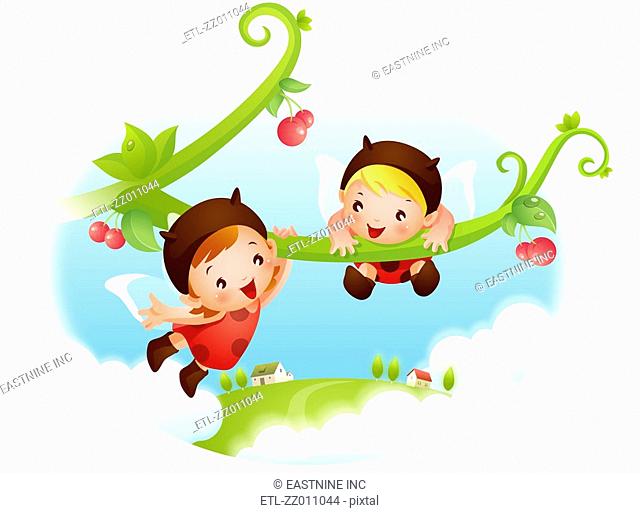 Two angels hanging from a branch