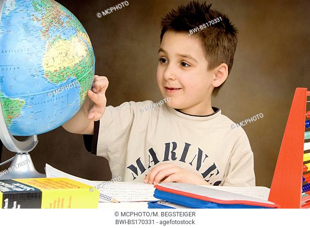 schoolboy with globe