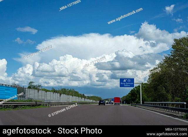Germany, Saxony-Anhalt, Burg, Autobahn 2 at the Burg-Zentrum exit, white clouds in the sky