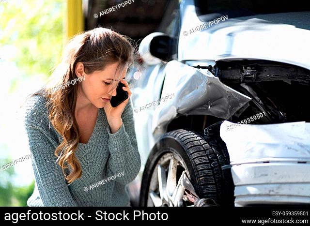 Woman Talking To Reliable Car Mechanic. Breakdown And Crash