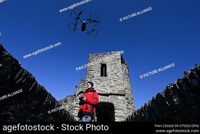 PRODUCTION - 05 April 2023, Hesse, Hohenstein: Werner Maziborsky of the company Linsinger ZT from St. Johann im Pongau (Austria) launches a drone on the...