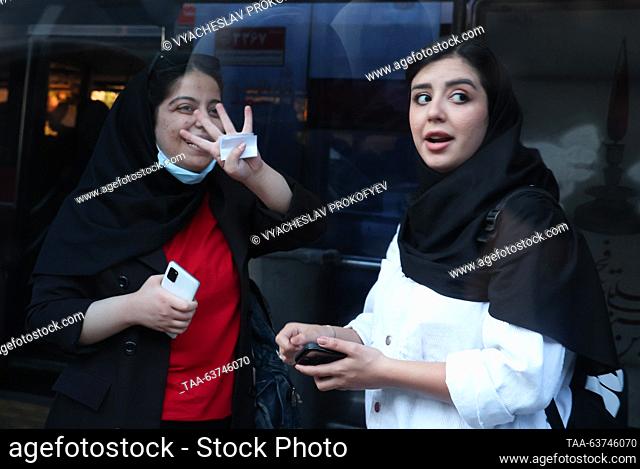 IRAN, TEHRAN - OCTOBER 23, 2023: Iranian women are seen in a street. Vyacheslav Prokofyev/TASS