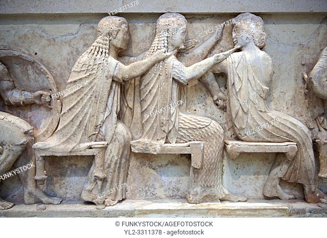 Treasury of Siphnos East Frieze representing scenes from the Trojan War. 525 b. C. . From Left: Aris, Afrodite, Artemis. Delphi Archaeological Museum