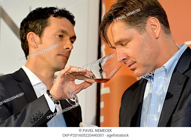 Sommeliers Andreas Wickhoff (left) and Greg Lambrecht (right) test the unique collection of wine, which comprises 136 bottles, each worth 200