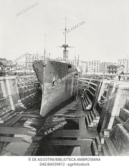 The cruiser San Giorgio in the dry dock in Castellammare di Stabia, for repairs following it being unstuck from the Gaiola shoal, Italy, photograph by Abeniacar