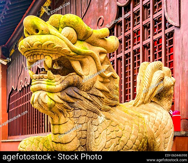SHANGHAI, CHINA, DECEMBER - 2018 - Sixteenth century mythologic stone lion sculpture at yuyuan garden, shanghai, china