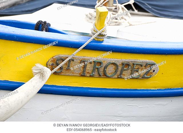 Text St. Tropez, inscription on a boat
