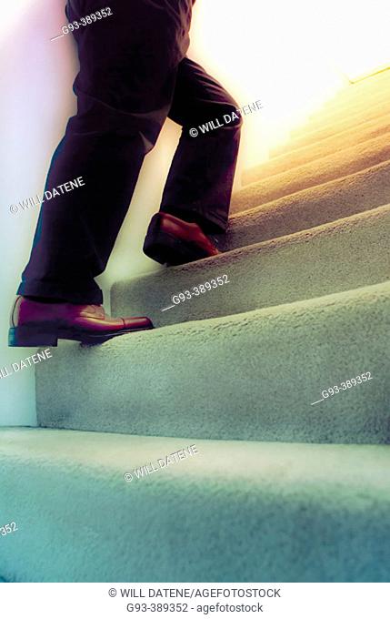 Person walking up stairs
