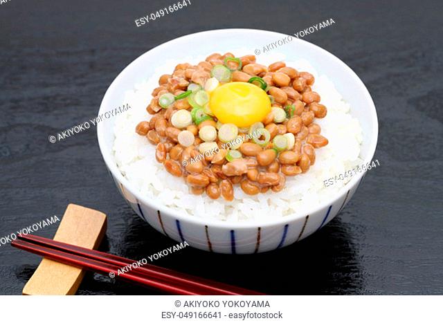 Japanes food, cooked white rice with natto on white background