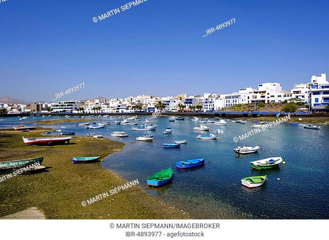 Fishing boats at low tide, Lagoon Charco de San Gines, Arrecife, Lanzarote, Canary Islands, Spain