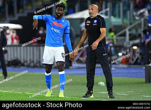 The Footballer of Napoli Andre-Frank Zambo Anguissa with coach Luciano Spalletti during the match Roma-Napoli at the Stadio Olimpico