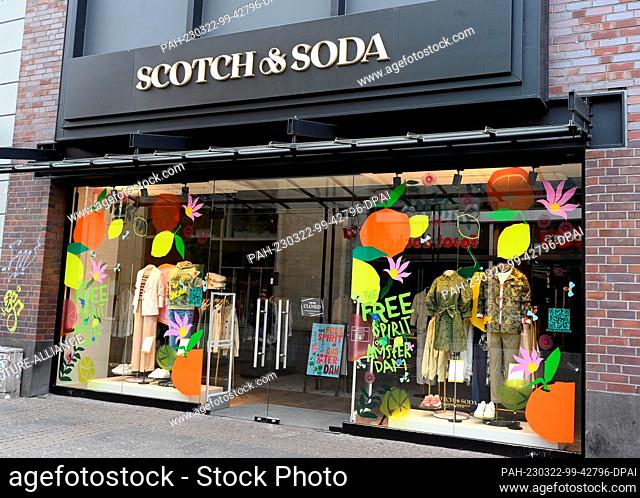19 March 2023, North Rhine-Westphalia, Cologne: Logo, lettering on a branch of the Dutch fashion house Scotch & Soda, a fashion label from the Netherlands...