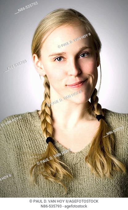Young girl in braids smiling