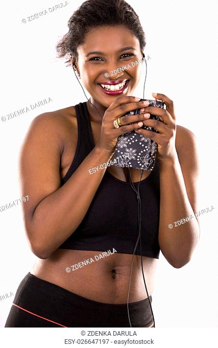 young black woman wearing fitness outfit on white isolated background