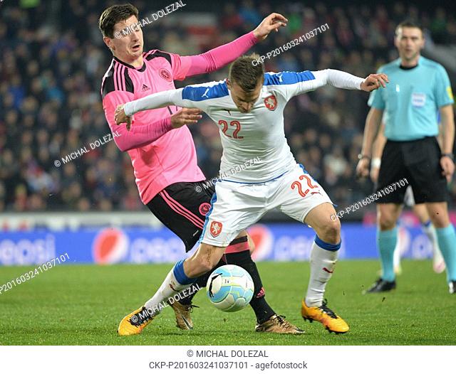 Kenny McLean of Scotland, left, and Vladimir Darida of Czech Republic in action during the friendly soccer match Czech Republic vs Scotland in Prague