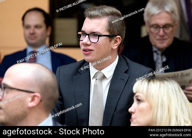12 December 2023, Bavaria, Munich: Daniel Halemba, AfD politician, takes part in a plenary session in the Bavarian state parliament
