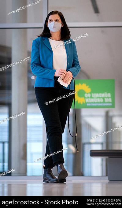 12 January 2021, Berlin: Katrin Göring-Eckardt, parliamentary group leader of Bündnis 90/Die Grünen, arrives with her mouth covered for a press statement at the...