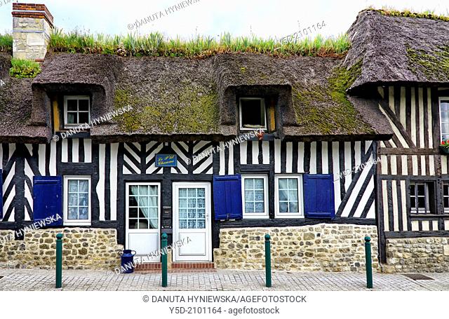 characteristic traditional architecture of Normandy, cottage with thatched roof, France,