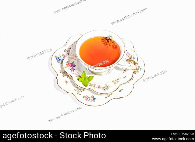 Delicate porcelian cup of tea for a refreshing high tea