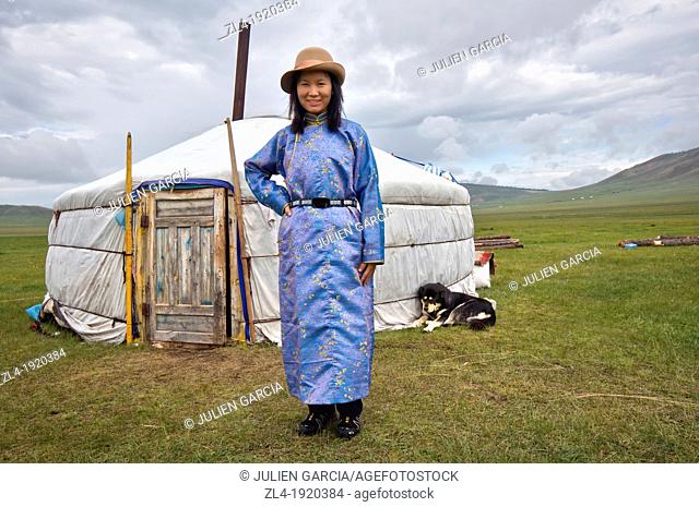 Woman in front of a yurt. Mongolia, Khovsgol, Zuun Nuur lake. Model Released. (/Julien Garcia)