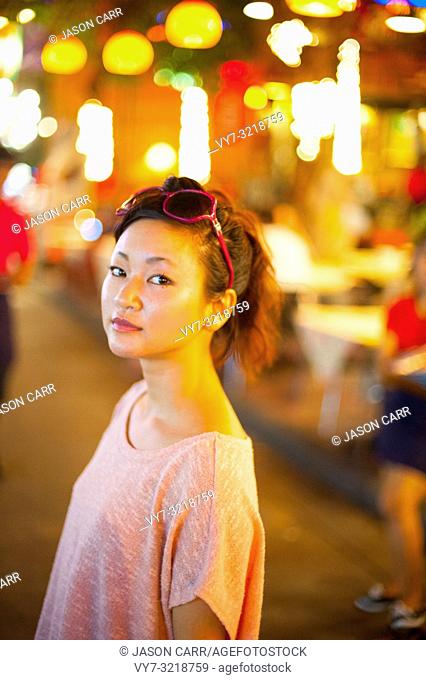 Japanese girl poses for pictures in Bangkok, Thailand