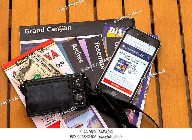 Travel planning accessories, camera, smart phone and travel maps, various USA maps, travel preparation and planning concept to Lake Powell area