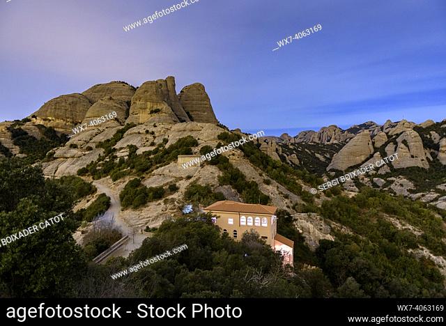 Montserrat spires at night, seen from the upper station of the Sant Joan funicular (Barcelona, Catalonia, Spain)