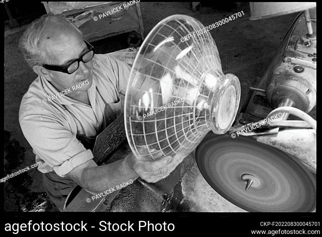 ***AUGUST 1, 1978, FILE PHOTO***Glass cutter works on patterns and designs on a glass bowl with rich decoration in Bohemia Glassworks in Brodce in the Trebic...
