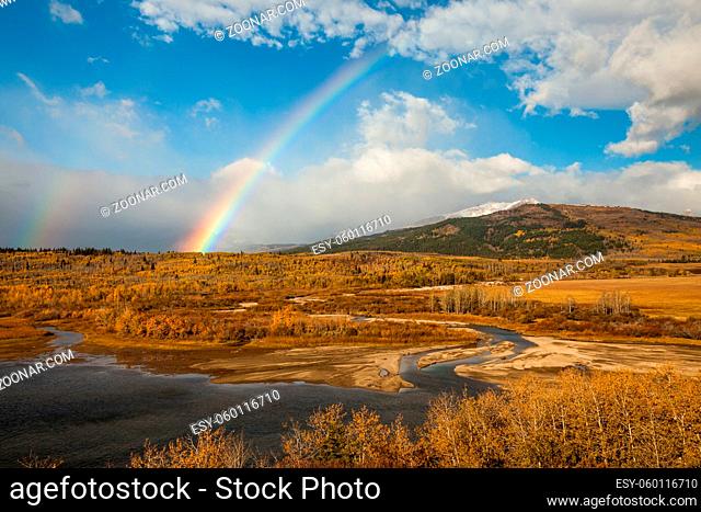A rainbow over Glacier National Park, Montana, USA in October