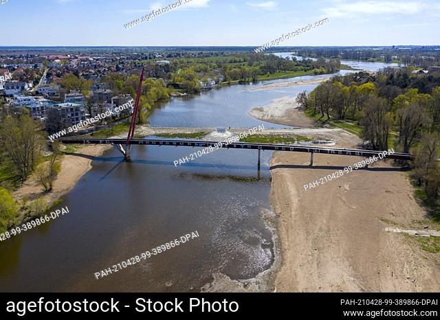 27 April 2021, Saxony-Anhalt, Magdeburg: Bridge at the Cracow waterfall. (Recorded with a drone) Photo: Stephan Schulz/dpa-Zentralbild/ZB