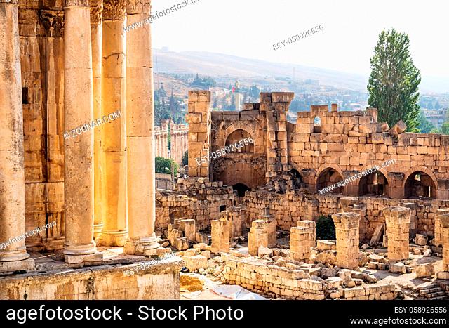 Roman ruins with Anti-Lebanon mountain range in the background at a sunny day, Baalbek, Lebanon
