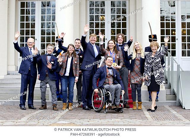 Dutch King Willem-Alexander (C), Princess Margriet (R), her husband Pieter van Vollenhoven (L) pose with Dutch participants of the Paralympic Games 2014 in...