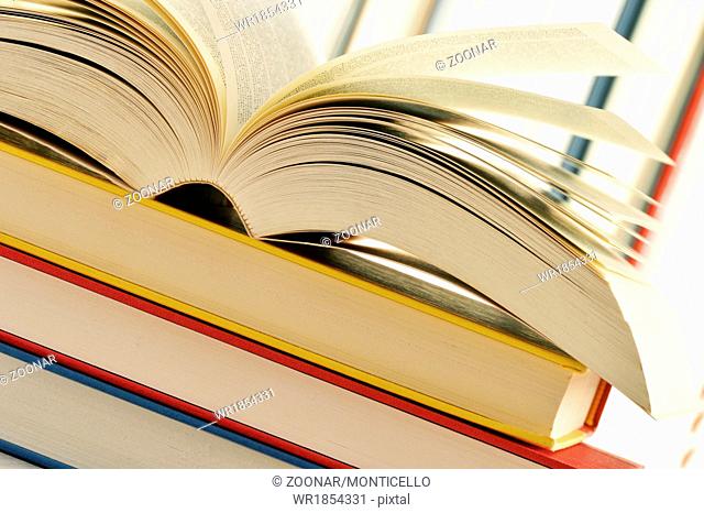 Composition with stack of books