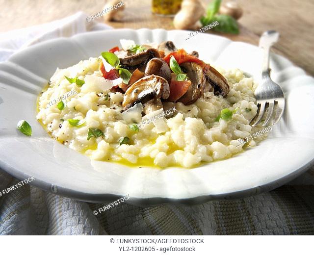 Classic risotto with wild porcini mushrooms and bacon